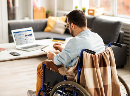 Person in wheelchair working from home